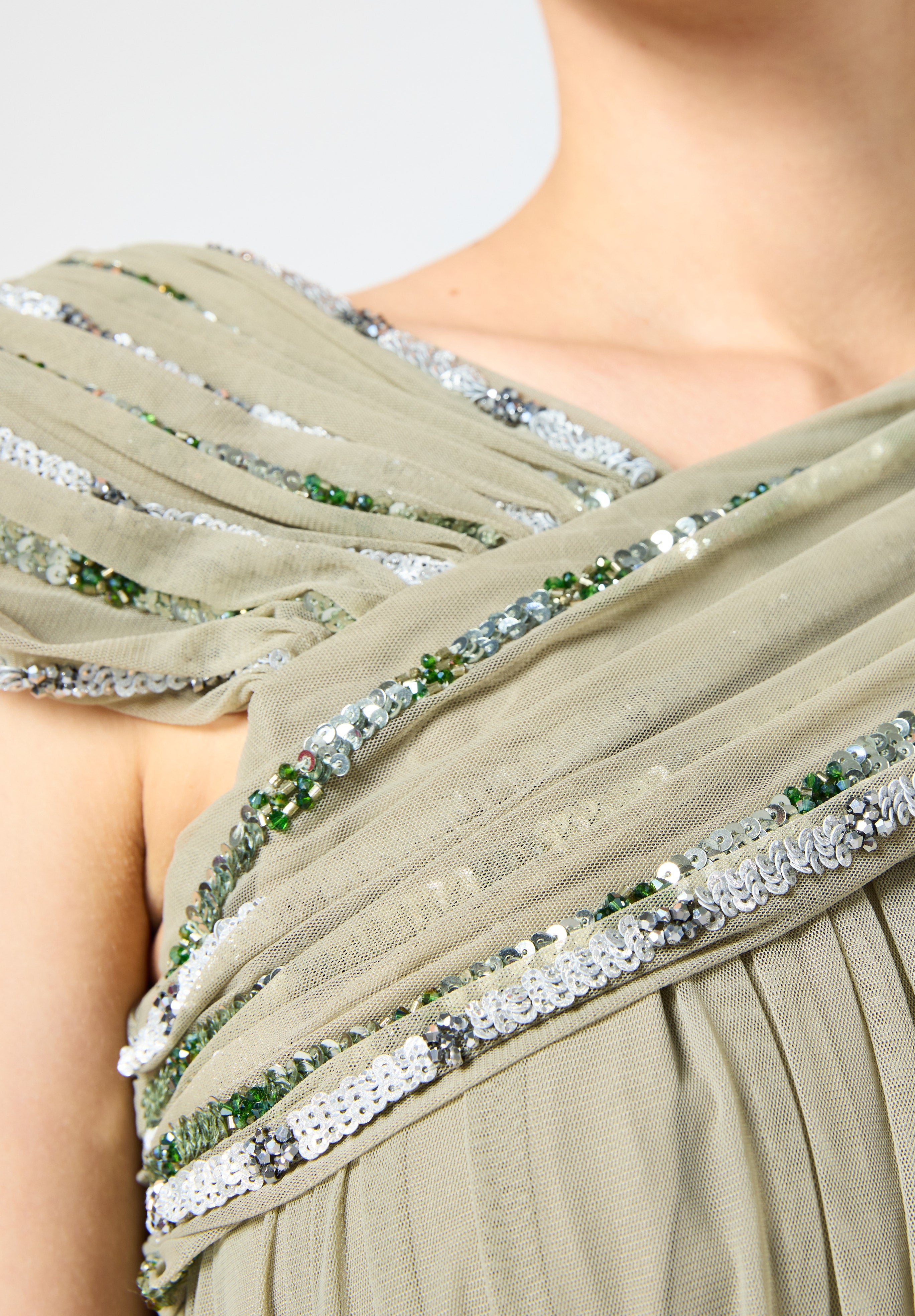 Beautiful Embroidered Tulle Dress With Drape Details On The Body And V-Neckline